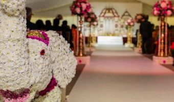 ​​​Traditional Manavarai with aisle decor and floral elephant